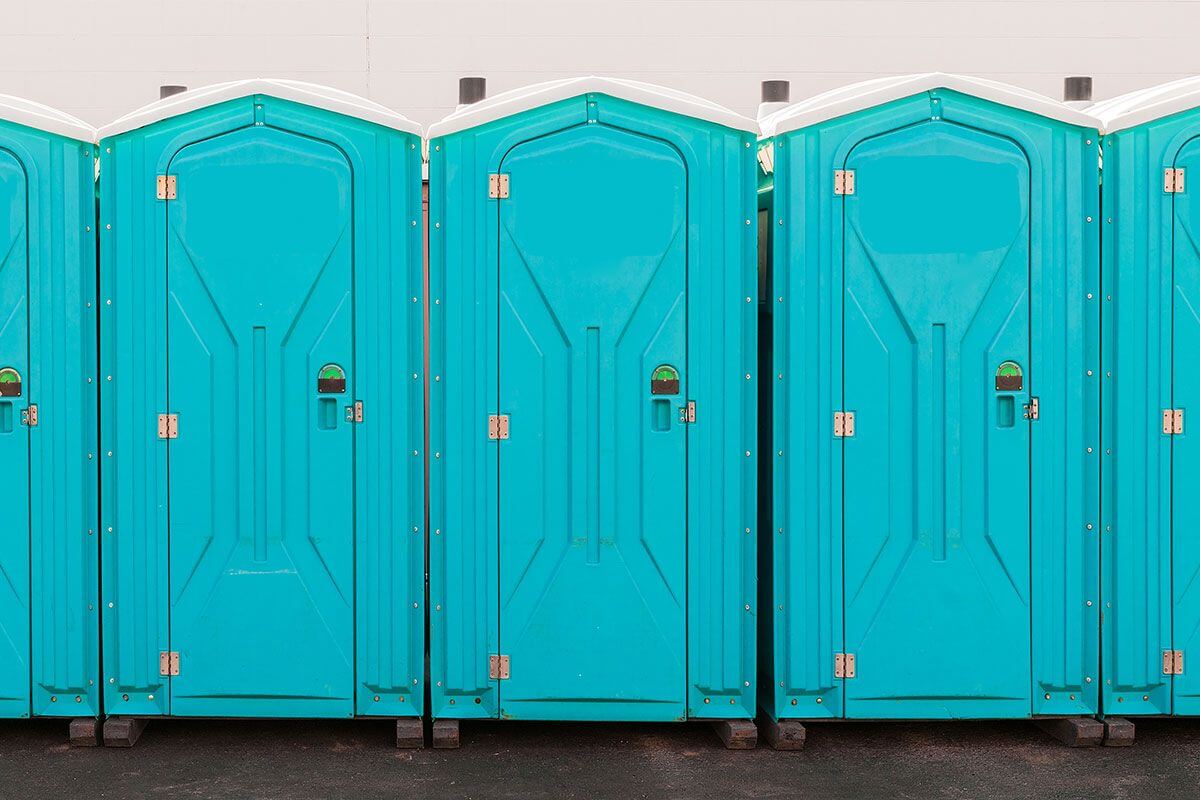 Industrial portable restroom units at a plant in Tuscaloosa, Alabama